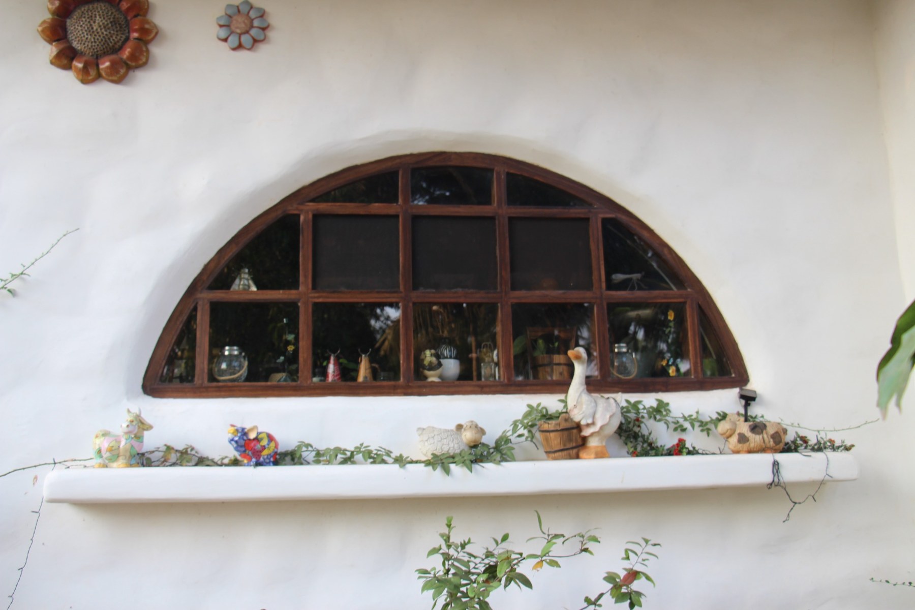 Arched window and sill at Bluebird Homestead