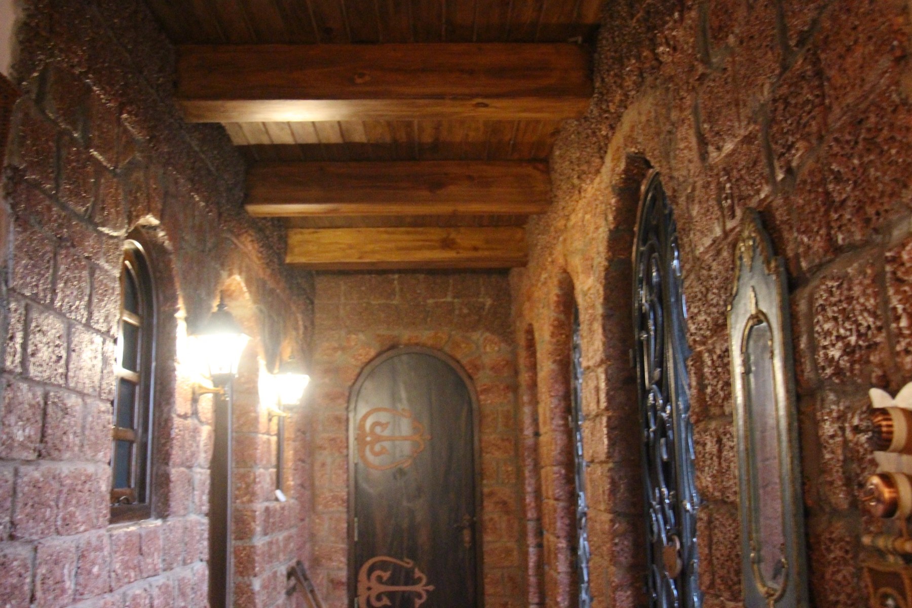 Textured stone entry passage at Bluebird Homestead
